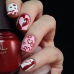 Дизайн ногтей к 14 февраля в красном, белом и розовом цвете с рисунками сердец разных стилей