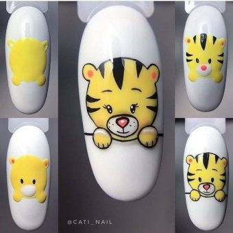 Дизайн ногтей средней длины в белом цвете с ярким 3Д-рисунком в виде тигренка