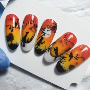Дизайн ногтей «Вечер в саванне» с рисунками африканских зверей на фоне заката